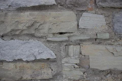 Masonry, old stone wall background Stock Photos