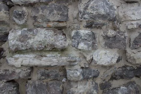 Masonry, old stone wall background Stock Photos