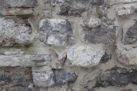 Masonry, old stone wall background Stock Photos