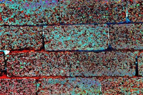 Masonry of rectangular porous blocks, changed colors, bright colorful backgro 写真素材