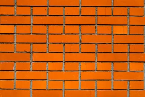 Masonry of red brick with cracks. Stock Photos