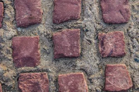 Masonry in red granite, background, texture Stock Photos