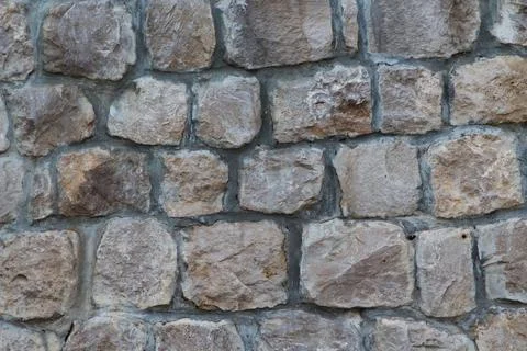 Masonry Rock Wall Texture. Texture of a stone wall. Part of old castle stone Stock Photos