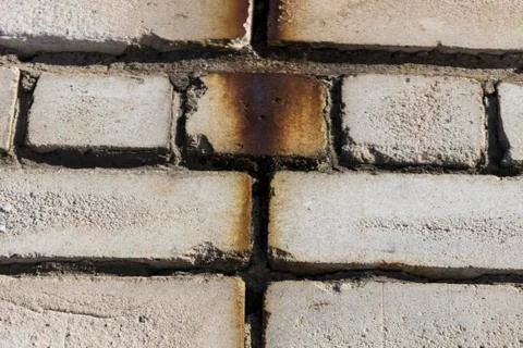 Masonry with rusty smudges, background, texture Stock Photos