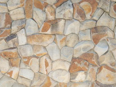 Masonry sandstone texture wall. Textured sandstone wall masonry cladding. Not a Stock Photos