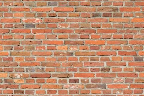 Masonry in a so-called standing brick bond with smoothed pointing. Stock Photos