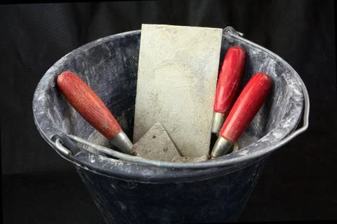 Masonry tools in a bucket Stock Photos