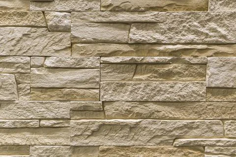Masonry wall paving stones as a background close up Stock-Fotos