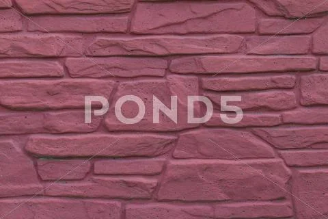 Masonry wall of red stone Stock Photos