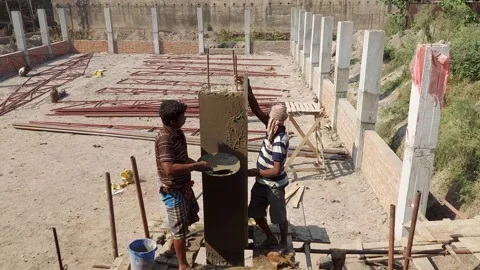 Masons are busy making pillars and architecture. Stock Footage 177355381