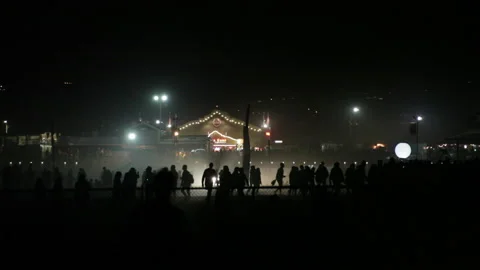 A mass crowd walking in the  beach Stock Footage 169569375