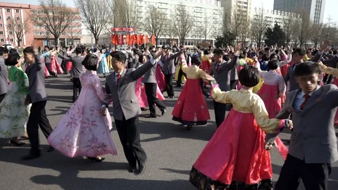 Mass dance at Day of the Sun in Pyongyang in Democratics Peoples Republic Video stock 107284528