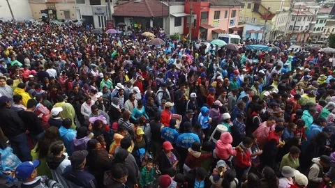 Mass of People Stream Down Street After Easter Procession in Ecuador Stock Footage 75056249
