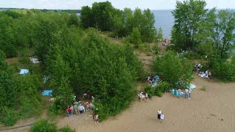 Mass Picnic Under The Trees On The Beach. Air View. Tatarstan. Stock Footage 126279171