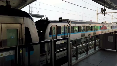 A Mass Rapid Transit train is entering a station in Jakarta Stock Footage 224447119