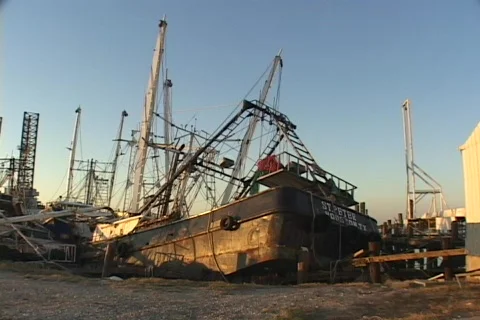 A mass of rubble shows what is left of fishing boats after Hurricane Katrina. Stock Footage 338283