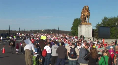 MASS OF RUNNERS OVER MEMORIAL BRIDGE - SPORTFILM 10194R - SPORTFILM 10193R Stock Footage 50793899