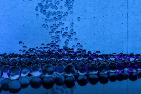 A mass of spheres falling down from above, 3d rendering. Ilustração Stock