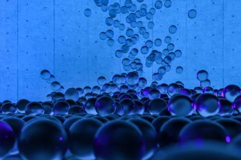 A mass of spheres falling down from above, 3d rendering. Ilustração Stock