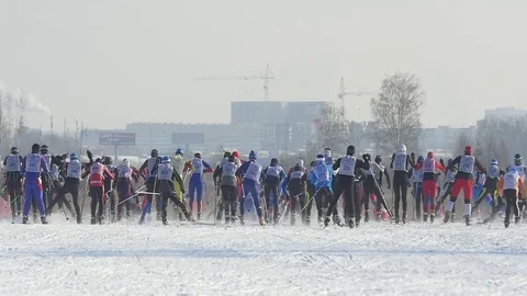 Mass start men athletes skiers during Championship on cross country skiing Stock Footage