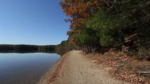 Massachusetts Walden Pond with path by shore Stock Footage