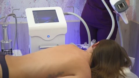 Massage. Advanced massage technologies. Laser massage device. Stock Footage 308063849