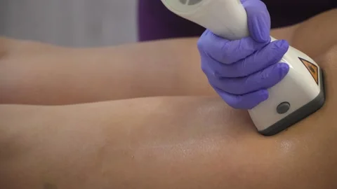 Massage. Advanced massage technologies. Laser massage device. Stock Footage 308064005