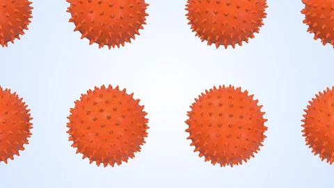 Massage Balls Falling on a Light Blue Background. Orange Spiky Balls. 4K Stock Footage 306949241