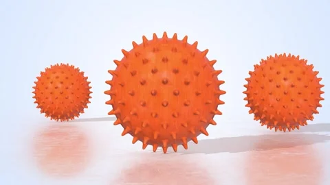 Massage Balls on a Light Reflective Floor. Orange Spiky Balls 3D Animation. 4K Stock Footage 306949243