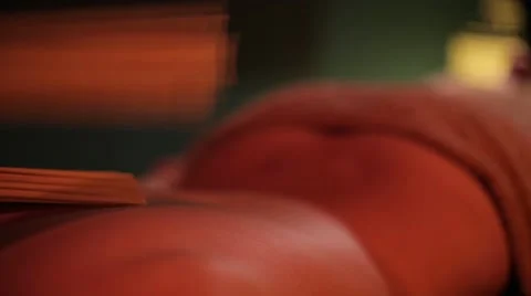 Massage with bamboo sticks close up Stock Footage 68459466