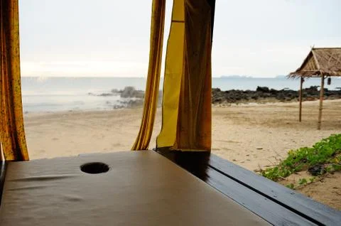 Massage on the beach Stock Photos