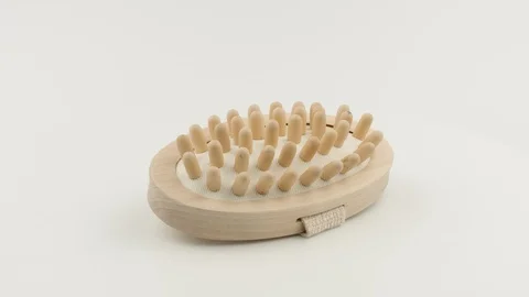 Massage brush for bathroom on white background. Vidéo 129694032