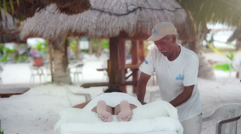 Massage at caribbean beach Stock Footage 37035158