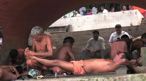 A massage on the Ghats, India Stock Footage 63209771