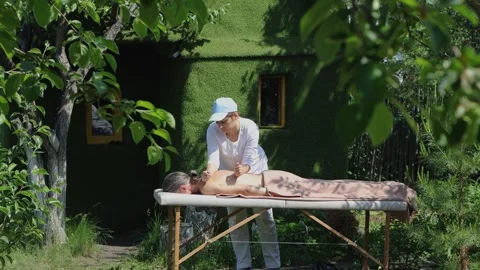 Massage in nature. Stock Footage 304335556