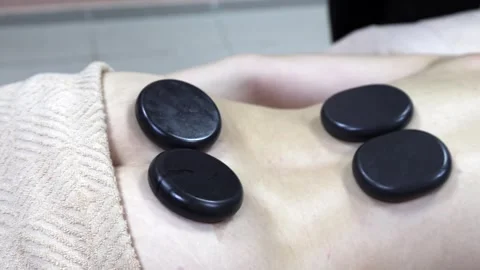 Massage parlor where procedures are carried out using hot stones Basalt Stock Footage 316528639