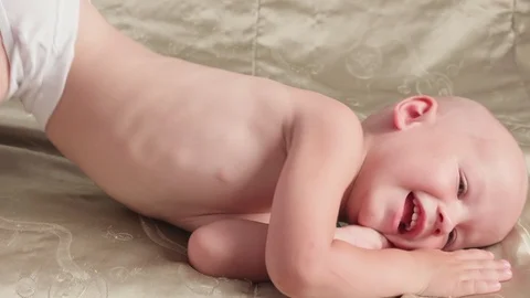 Massage professional therapist does for two years old baby boy child rehabili 스톡 동영상 118450418