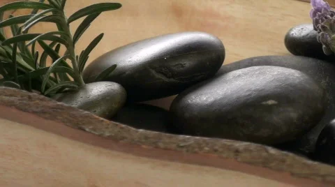 Massage rocks and herbs loop V1 - HD Stock Footage 572612