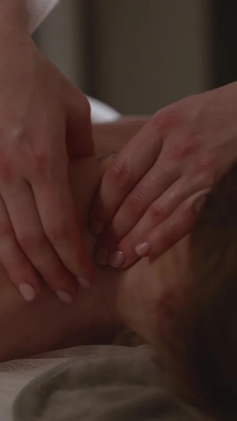 Massage session focusing on relaxation in a quiet room at a spa location Stock Footage 341280760