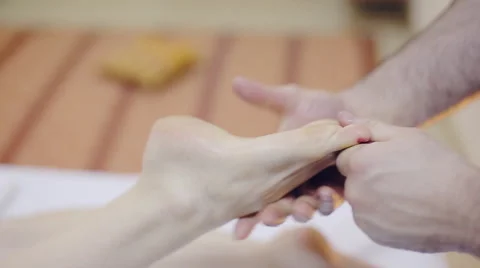 Massage therapist making massage of foot. Spa Stock Footage 58564002