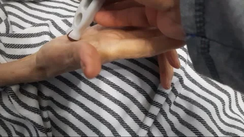 Massage Tool on Hand Stock Footage 332229352