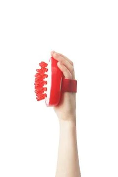 Massager in hand on a white background Stock Photos
