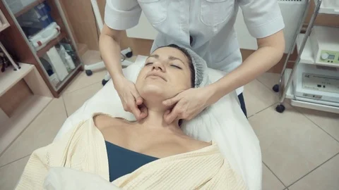 Massaging neck Stock Footage 87825146