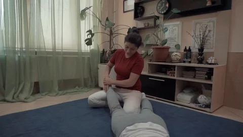 Massaging shin Stock Footage 87825470