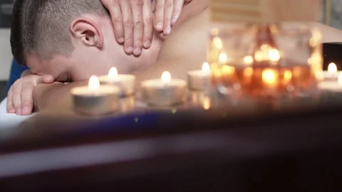 The masseur doing neck and head health massage for man in spa salon. 4K Video stock 97655238