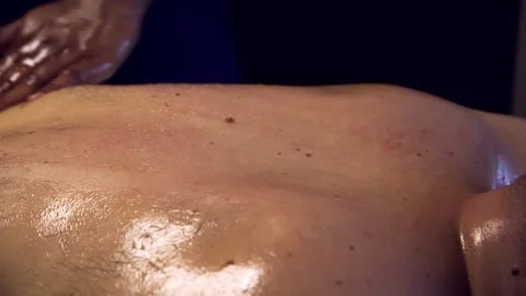 Masseur Gently Massages A Man's Back Stock Footage 263345282