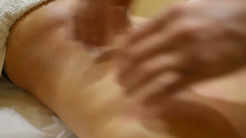 Masseur man doing back massage to a young woman Stock-Footage 102782620