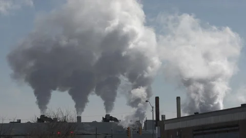 Massive Air pollution from heavy industry manufacturing factory smokestack Stock Footage 157757853