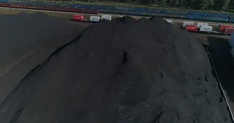 Massive amount of coal in depot seen from drone Stock Footage 220631526
