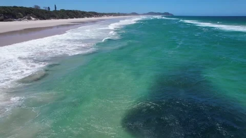 Massive Bait Ball Of Fish Beneath The Surface Near The Shore Of Byron Bay In 動画素材 329625223
